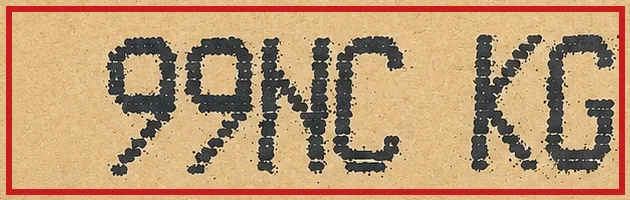 Close-up of the stamped code 99NC KG on a Hot Wheels 2026 case box - the trailing C identifies this as Case C.